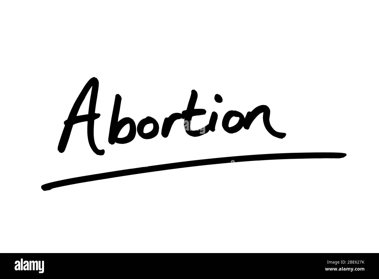 Le mot avortement est écrit à la main sur un fond blanc. Banque D'Images