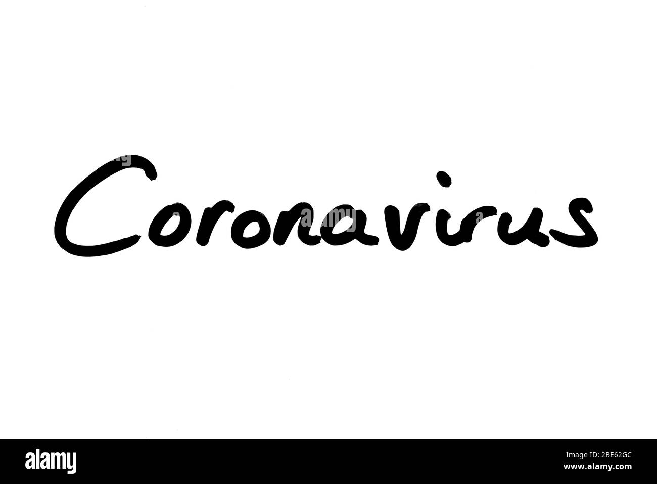 Le mot Coronavirus manuscrit sur un fond blanc. Banque D'Images
