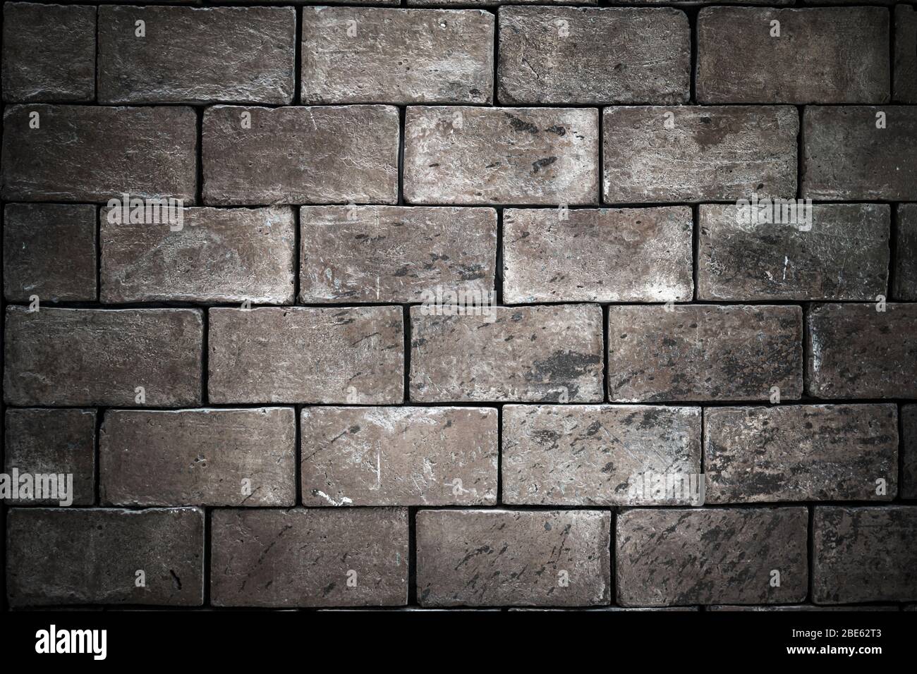 Fond de texture, mur de briques, éclaboussures et rayures. Blocs. Banque D'Images