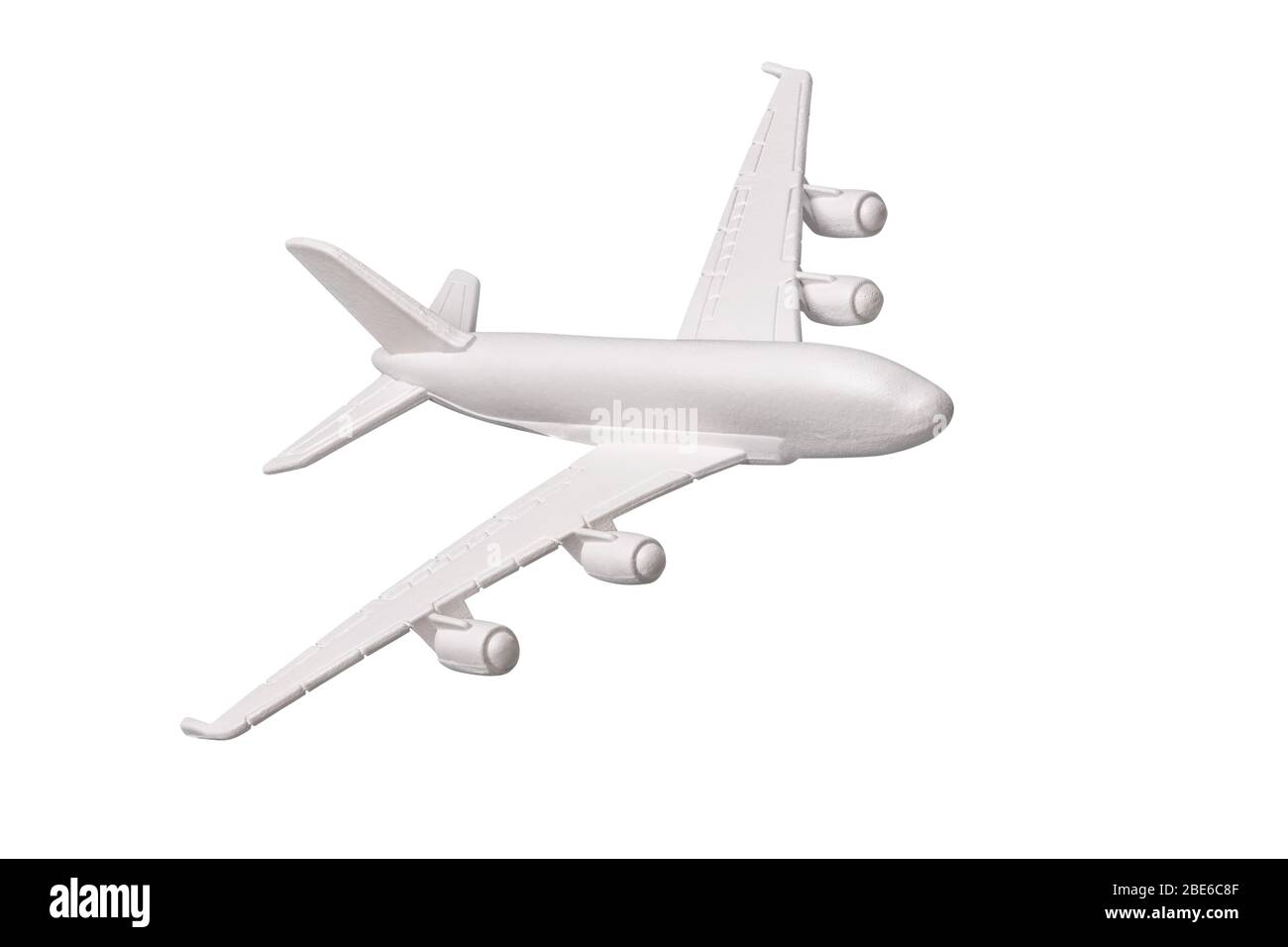 Avion jouet isolé sur fond blanc, gros plan. Photo empilée Banque D'Images
