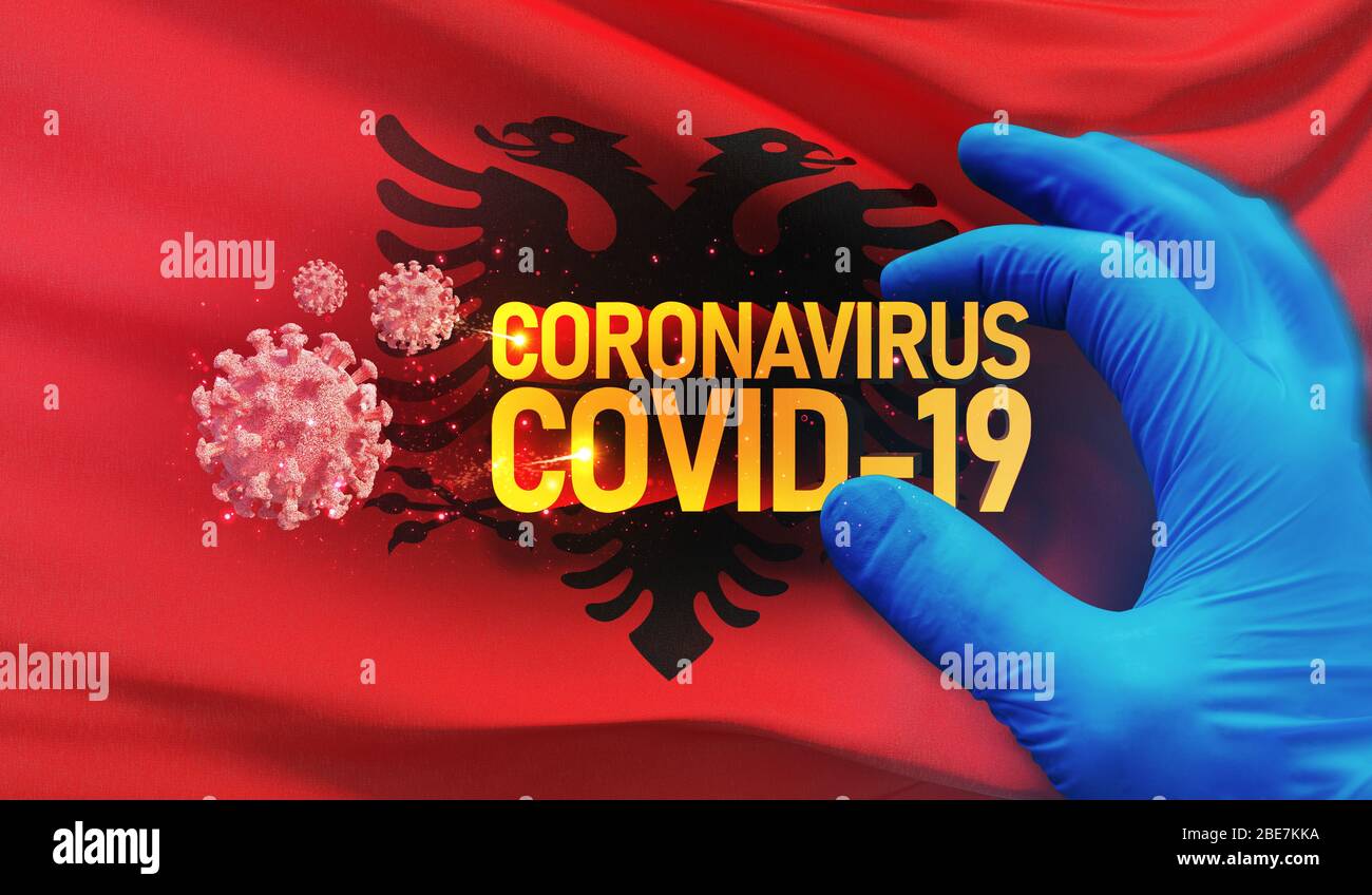 Coronavirus COVID-19 concept d'éclosion, virus menaçant la santé, contexte agitant le drapeau national de l'Albanie. Une pandémie arrête l'éclosion de Novel Coronavirus Banque D'Images