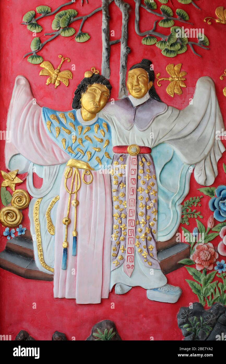 Œuvres d'art représentant un couple chinois dans une robe traditionnelle Banque D'Images