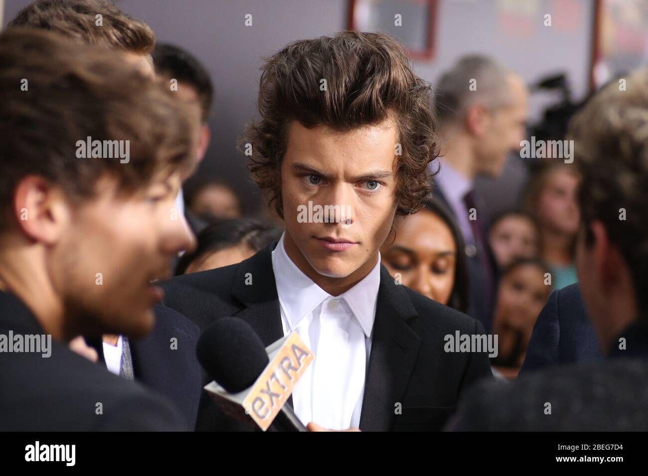 Harry Styles assiste à la première mondiale de 'One Direction: C'est nous' au Ziegfeld Theatre le 26 août 2013 à New York City. Banque D'Images