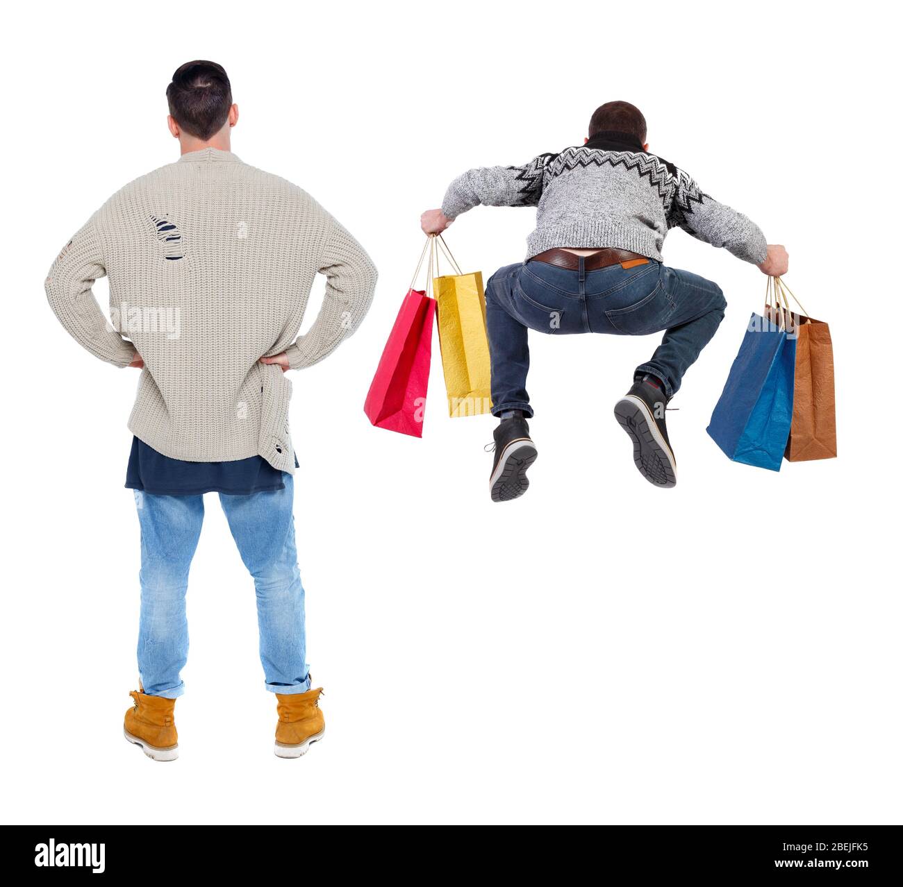 vue arrière de deux hommes avec des sacs de shopping. vue arrière de la personne. Vue arrière de la collection People. Isolé sur fond blanc. Banque D'Images