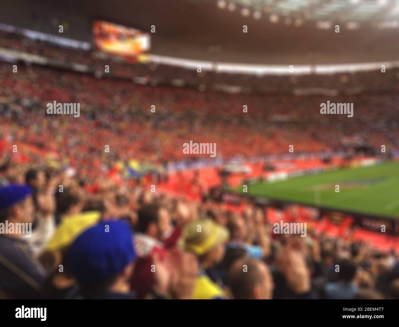 Foule floue de spectateurs sur le stade lors d'un événement sportif Banque D'Images