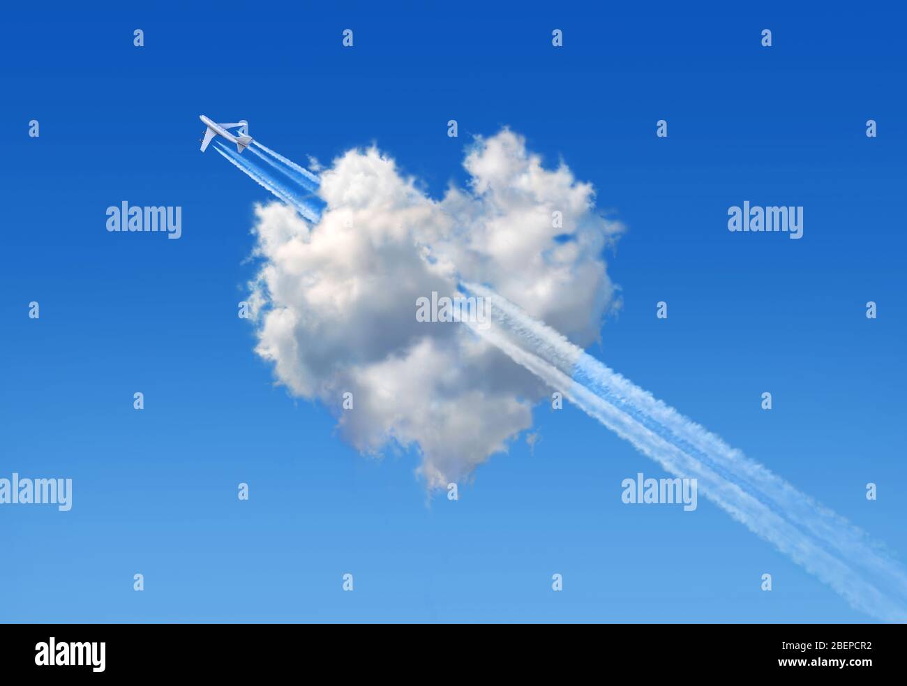 Nuage moelleux avec la forme d'un coeur dans un ciel bleu et un jumbo jet qui le traverse symbolisant une flèche comme signe d'amour. Banque D'Images