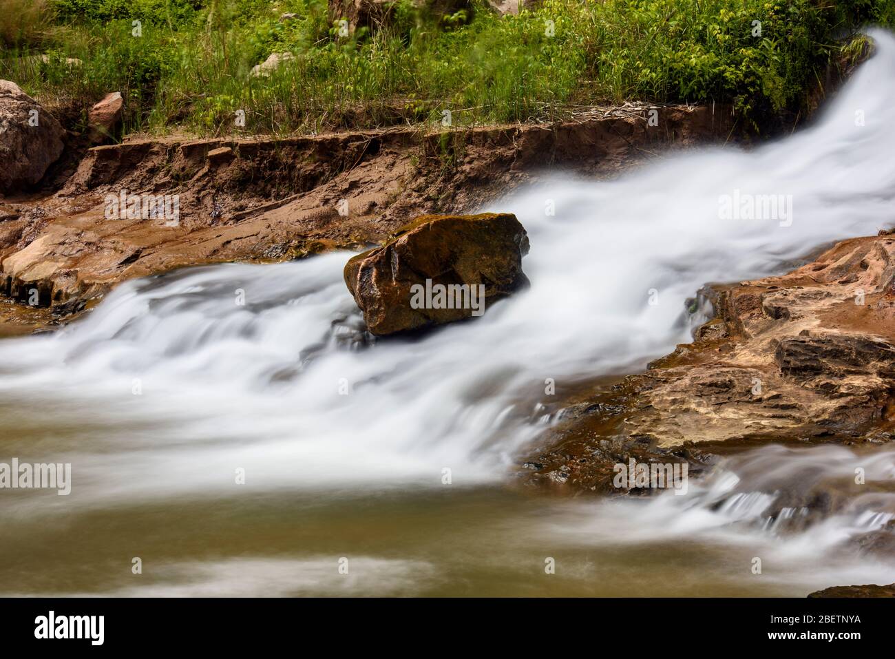 Cascade de Vasey's Paradise, qui s'étend sur des murs de grès près du fleuve Colorado, du parc national du Grand Canyon, Arizona, États-Unis Banque D'Images