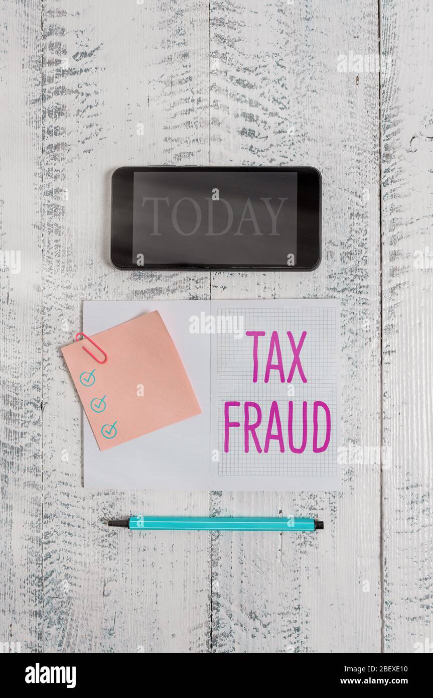 Fraude Fiscale Meaning Rédaction conceptuelle de la main montrant la fraude fiscale. Concept  signifie qu'il faut tricher une déclaration de revenus pour éviter de payer  le smar carré de marqueur de carnet de notes Photo