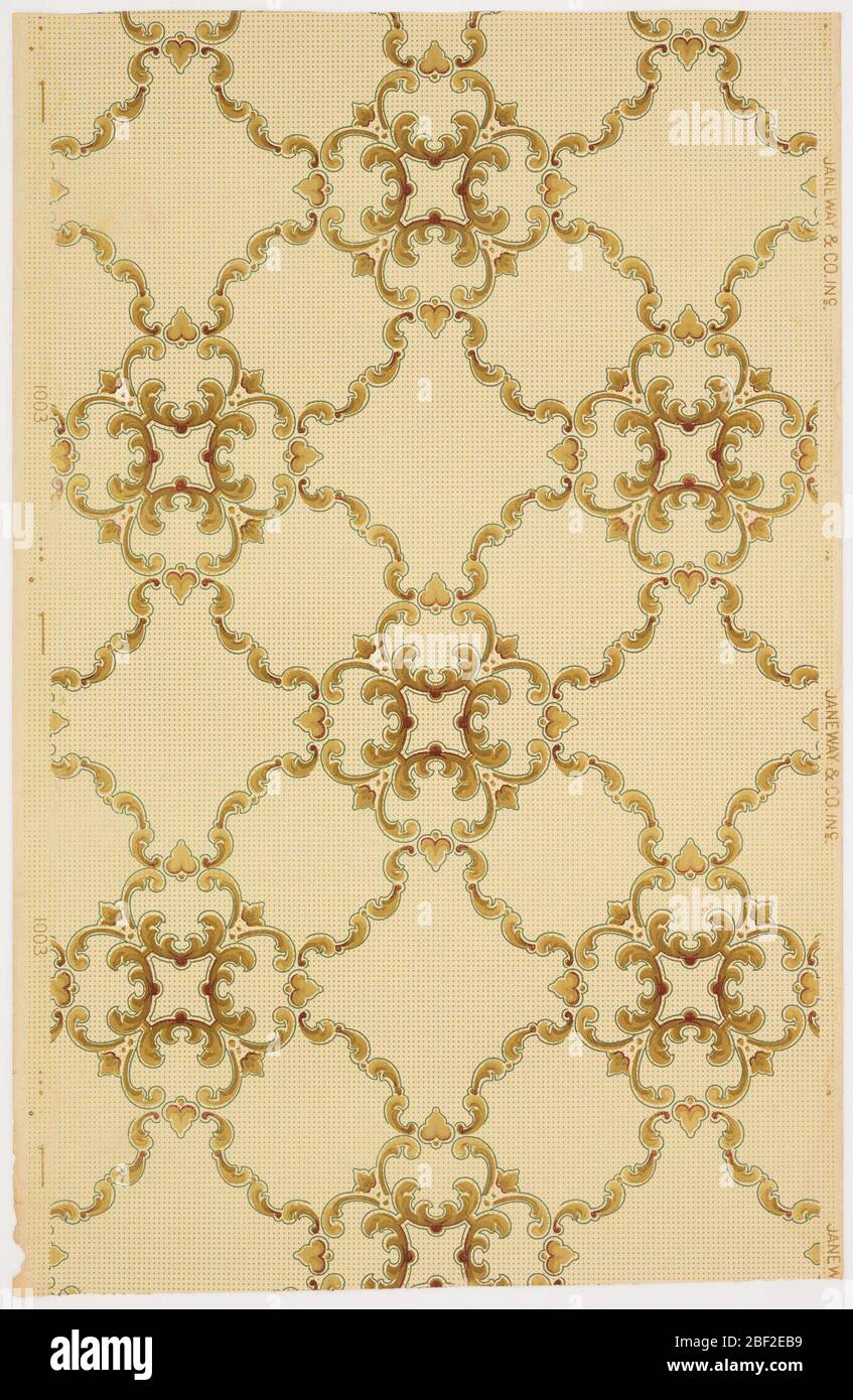 Papier de plafond. Cadre de grille ou de treillis avec un motif de type quatrehuile aux intersections. Imprimé en marron et marron clair sur un sol à pois brun clair. Banque D'Images