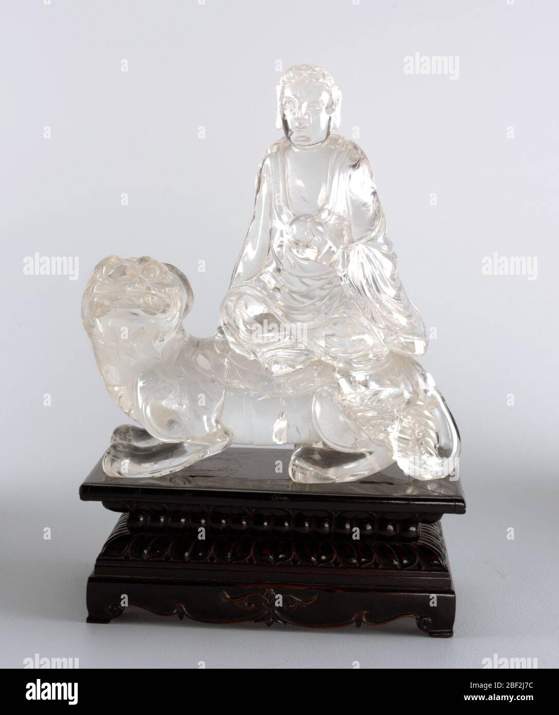 Bouddha assis sur le chien de Foo. Banque D'Images