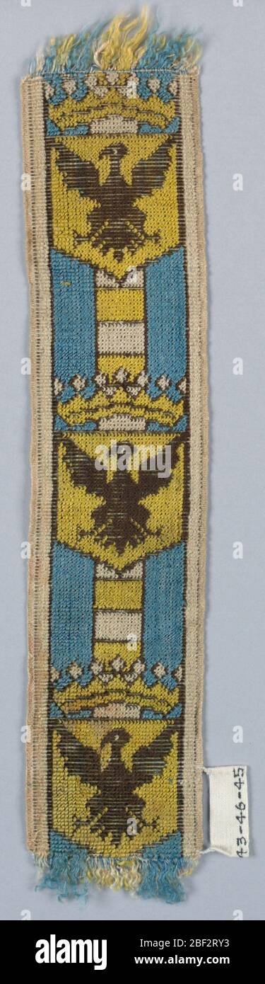 Rognage. Blindage couronné montrant aigle étalé (noir sur jaune); masse de bleu clair avec bande centrale avec bandes horizontales de jaune et blanc. Banque D'Images