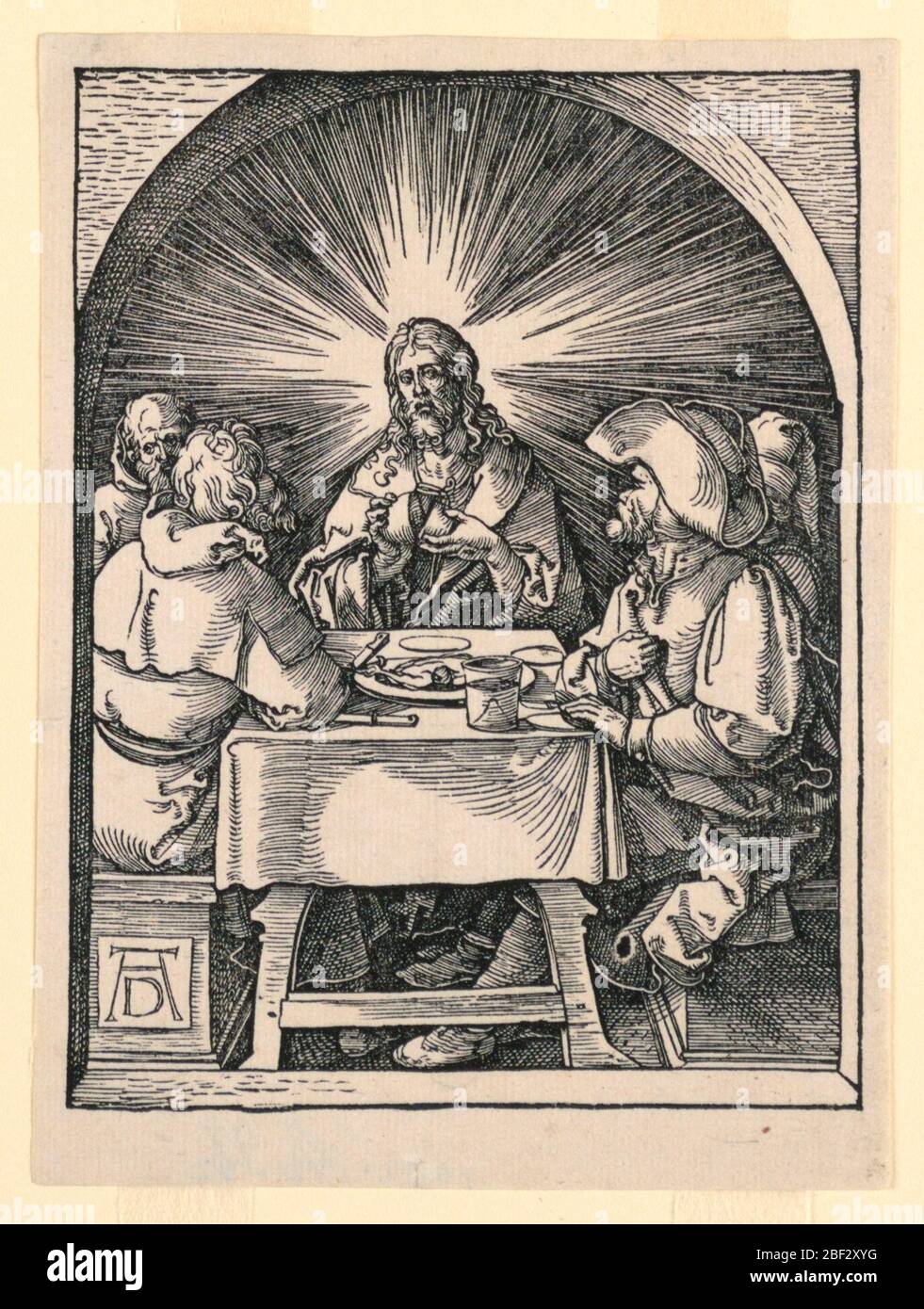 Christ à Emmaus de la série Little Passion. Par une ouverture archae, Christ fait face au spectateur au centre de la composition. Deux figures de chaque côté de la table lui regardent casser le pain. Monogramme de Dürer, en bas à gauche. Banque D'Images