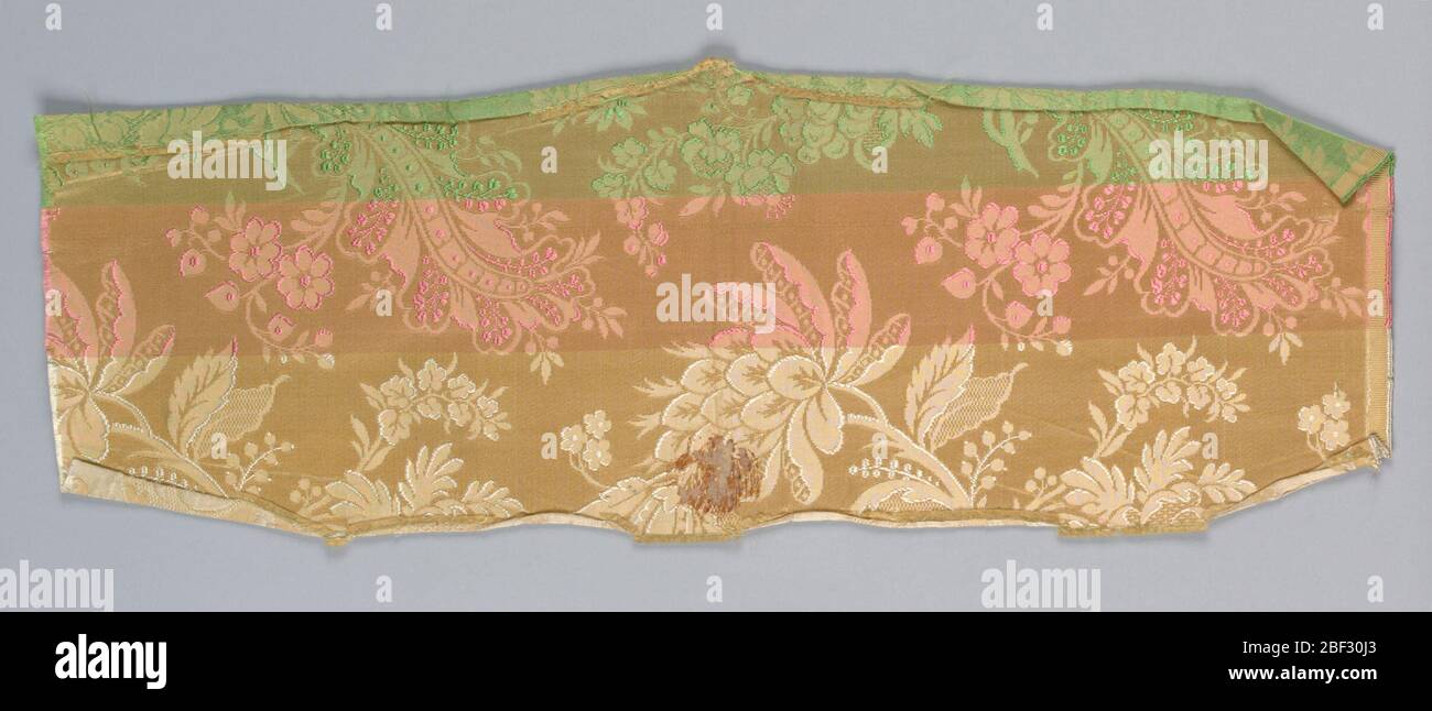 Échantillon. Chaîne jaune avec bandes de trame blanche, puis trame rose et trame verte. Banque D'Images