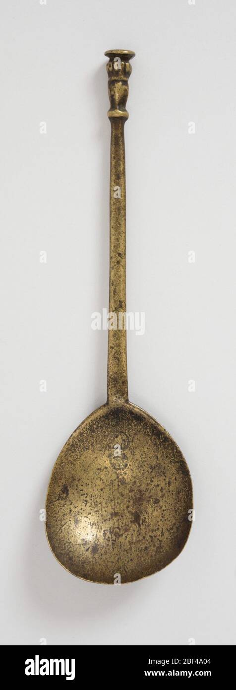 Cuillère. Bol circulaire surmonté par un arbre cylindrique fin avec joint circulaire supérieur. Banque D'Images