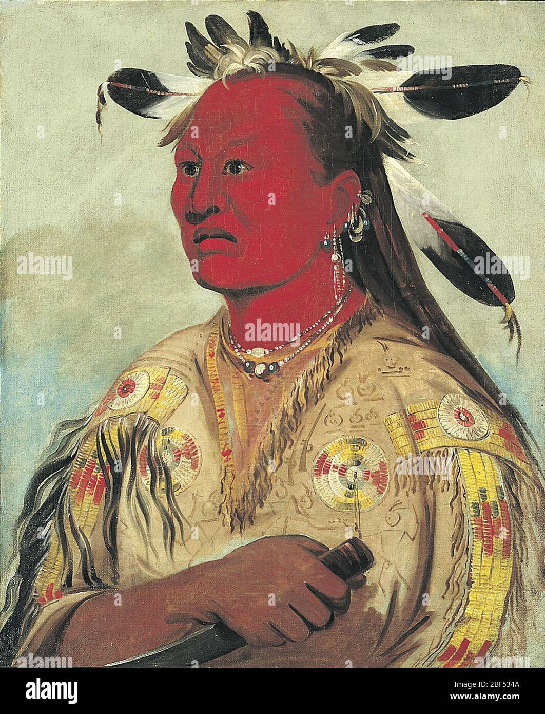 Strnaupat Bloody, chef de la main de la Tribe. George Catlin a décrit Bloody Hand, chef de la tribu Arikara, comme ayant « son visage peint avec le vermilion rouge, le couteau à ébouler dans sa main » et « portant une belle robe ». Catlin a eu la chance de rencontrer Bloody et sa fille lorsqu'ils visitaient le plus petit de deux Mand Banque D'Images
