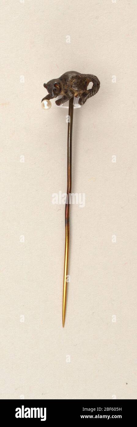 Axe de bras. Sous forme de chat jouant avec une perle de balle. Banque D'Images