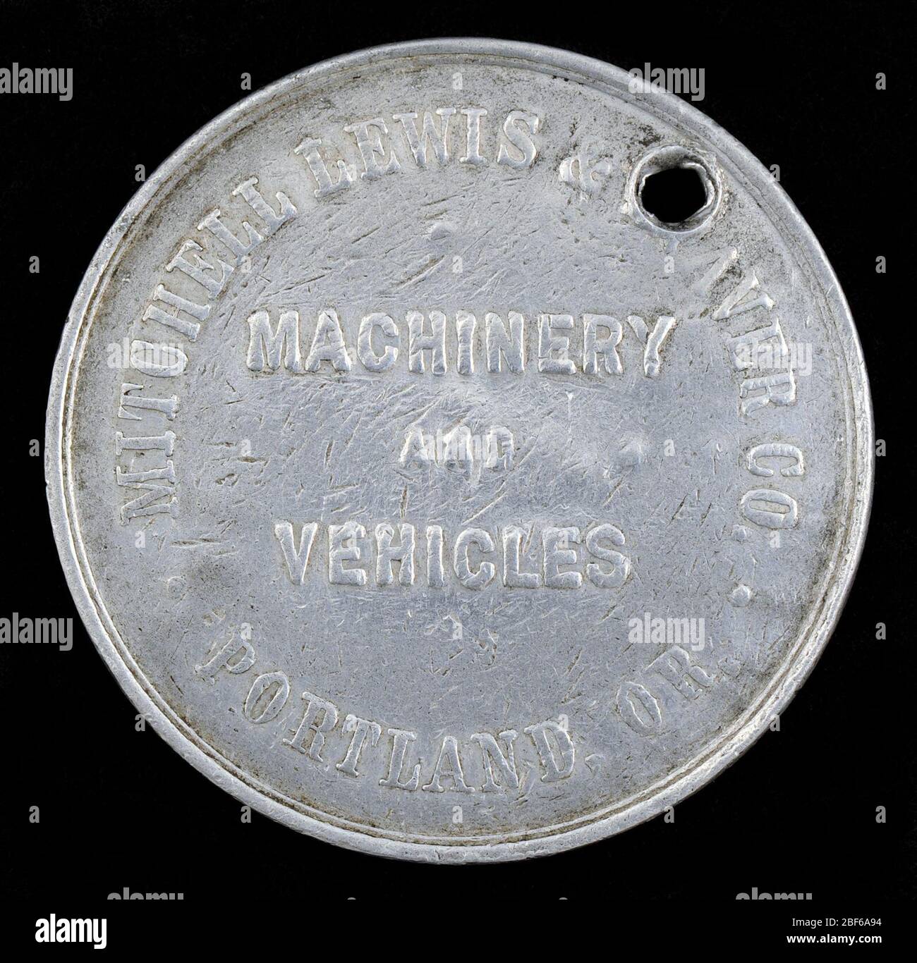 Étiquette Portland Oregon Owney. Owney a reçu ce jeton d'un groupe de commis du service de courrier ferroviaire (RMS) travaillant à Portland, Oregon, sur une voiture de courrier ferroviaire « South bound ». Banque D'Images