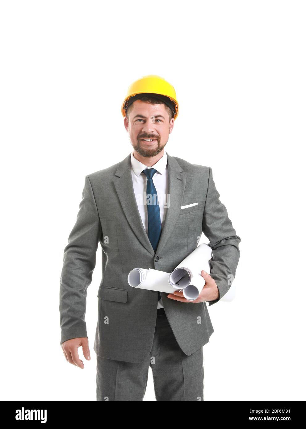 Ingénieur masculin avec des dessins sur fond blanc Banque D'Images