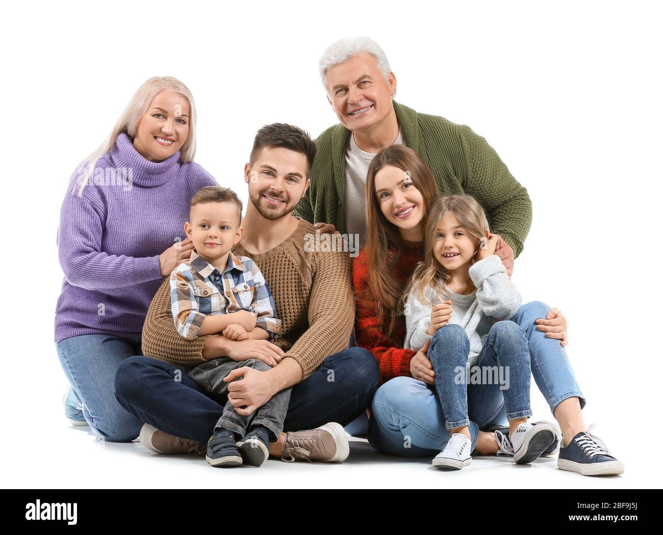 Portrait de la grande famille sur fond blanc Banque D'Images