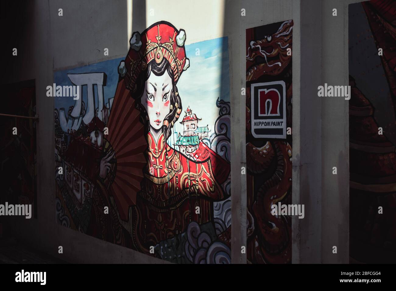 Street Art avec éclairage sévère (Singapore Street Art) Banque D'Images