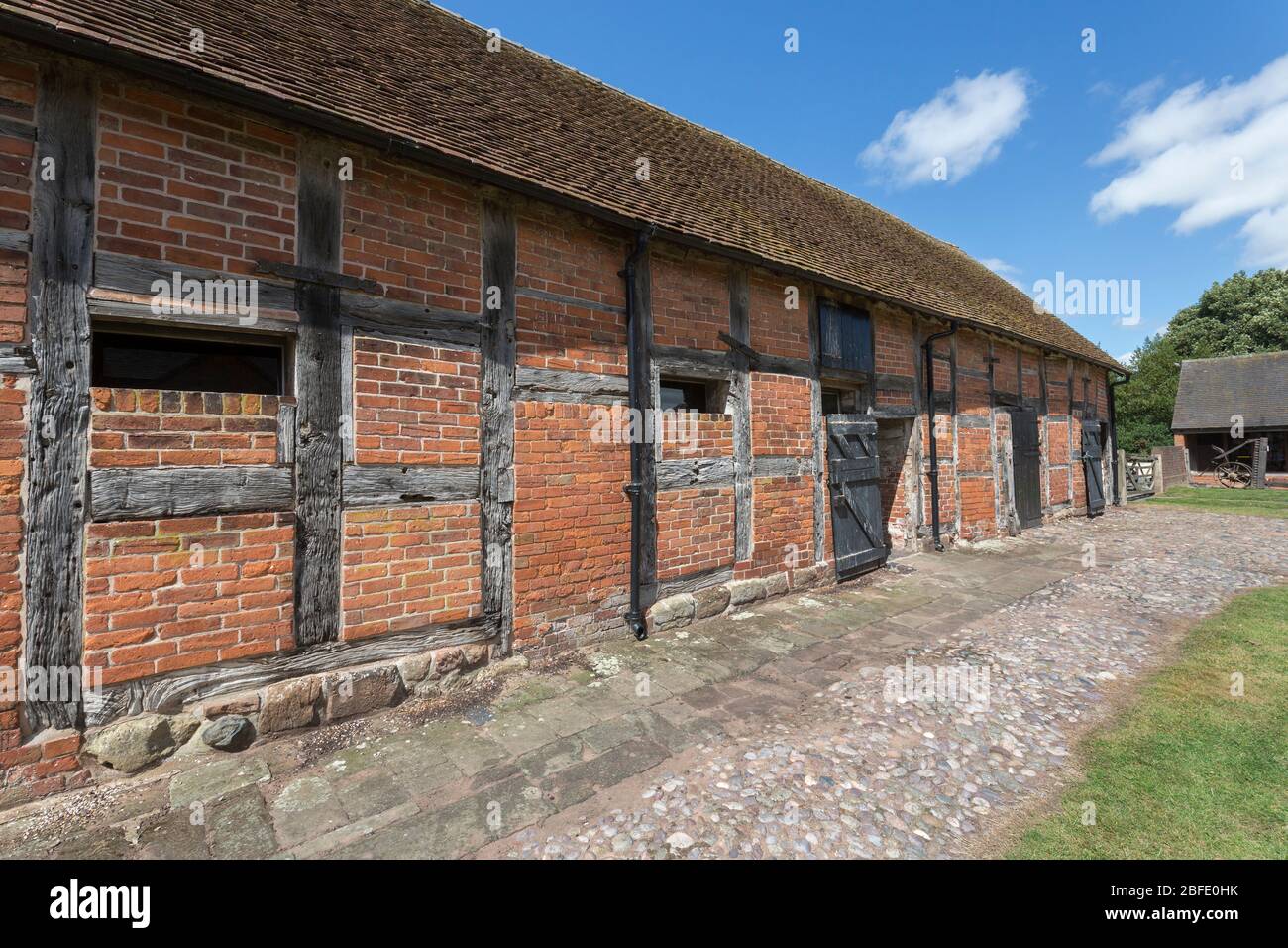 Mur de grange en bois et en briques, Boscobel House, Shropshire, Angleterre, Royaume-Uni Banque D'Images