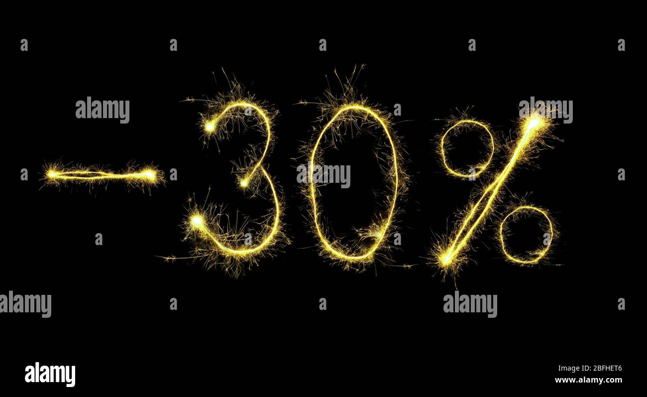 Vente 30 pour cent en paillettes sur fond noir Banque D'Images