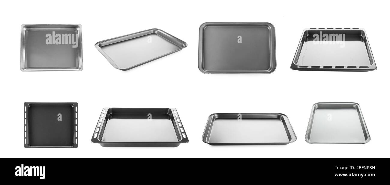 Jeu de plaques de cuisson vides pour four sur fond blanc Banque D'Images