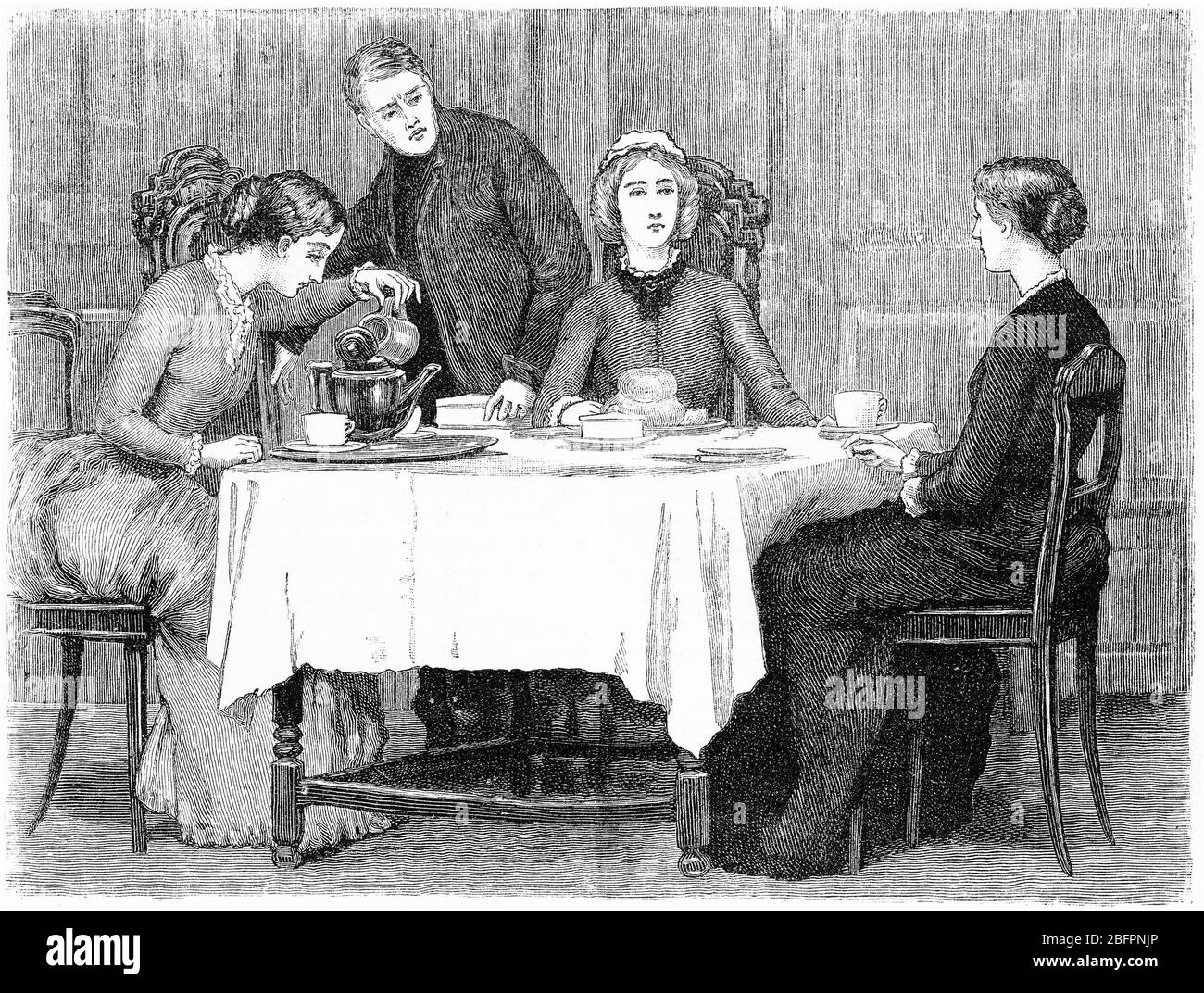 Gravure d'une famille s'installant vers 1850 à une tasse de thé anglais traditionnel. Banque D'Images