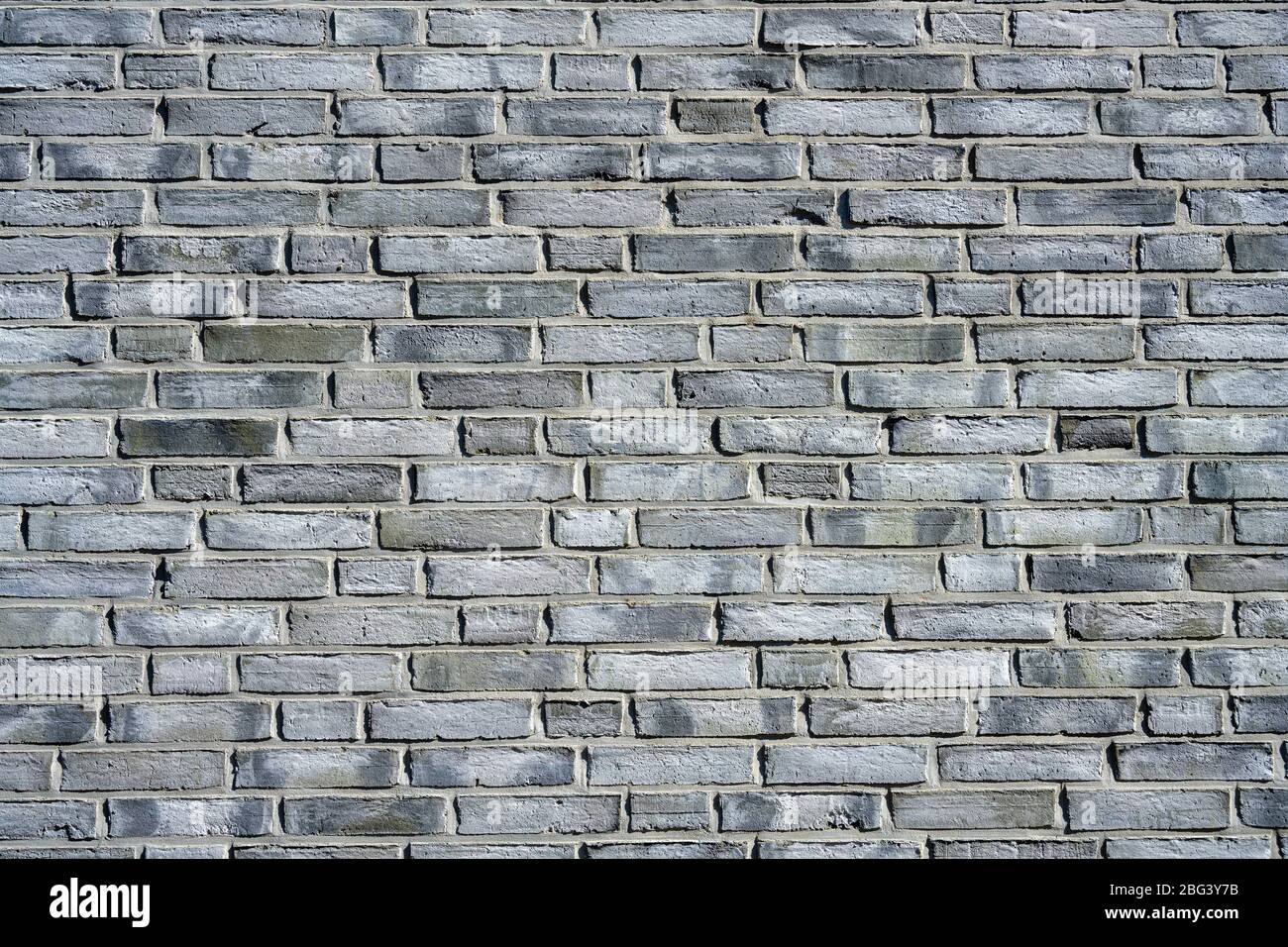 Arrière-plan d'un mur de briques gris propre Banque D'Images Arrière-plan d'un mur de briques gris propre Banque D'Images