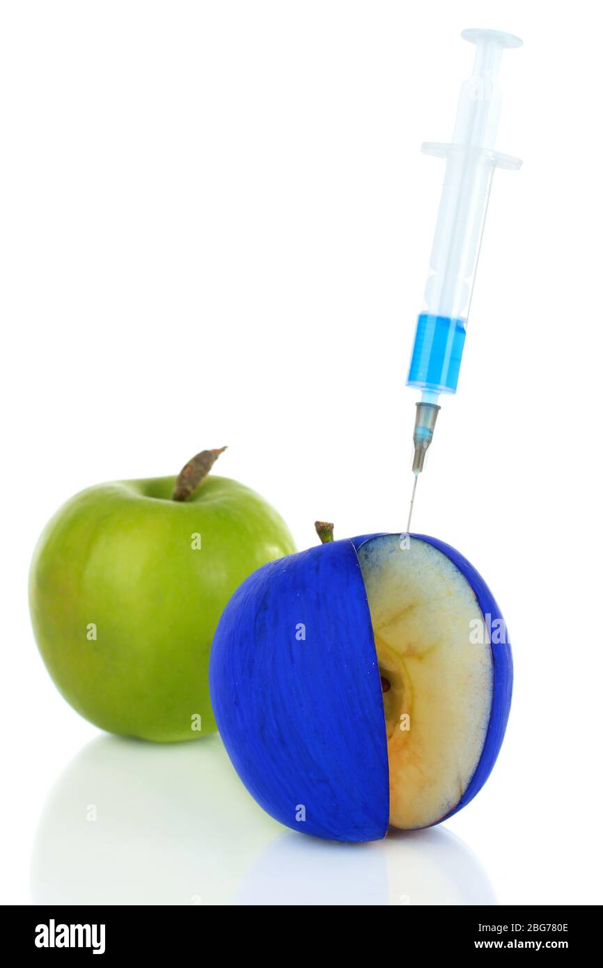 Injection dans pomme isolée sur blanc Banque D'Images