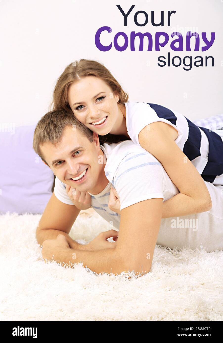 Happy young couple at home Banque D'Images