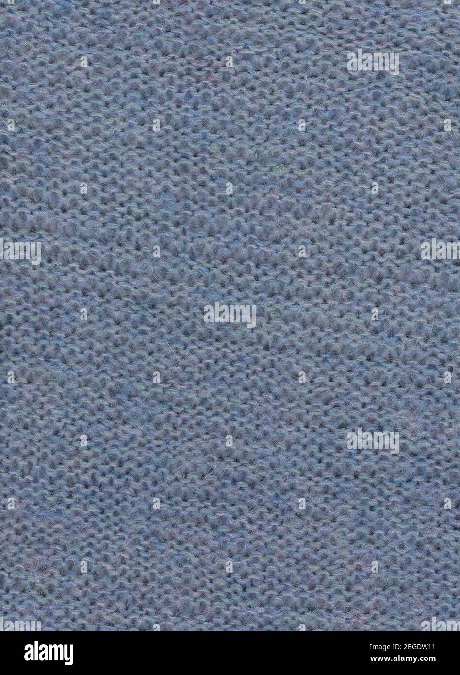 Pull en laine. Texture du tissu tricoté. Arrière-plan par temps froid. Banque D'Images