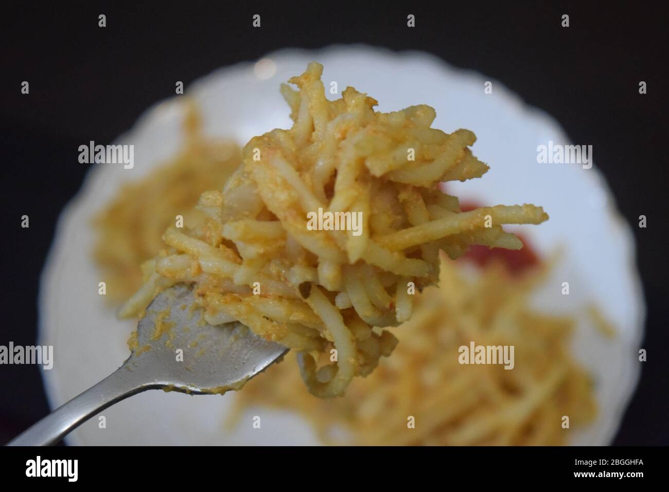 spaghetti à la sauce tomate et au poulet Banque D'Images