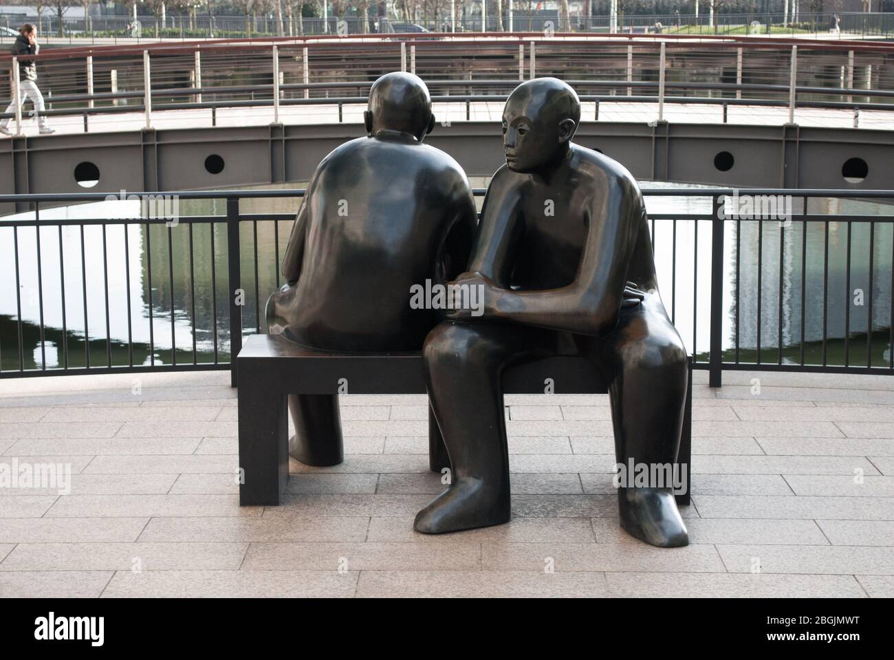 Giles Penny assis Figures Cubitt Steps, Canary Wharf E14 Banque D'Images