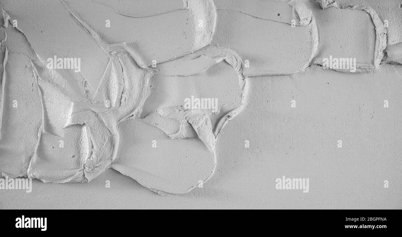 Texture en béton stuc blanc brut et gris abstrait pour l'arrière-plan Banque D'Images