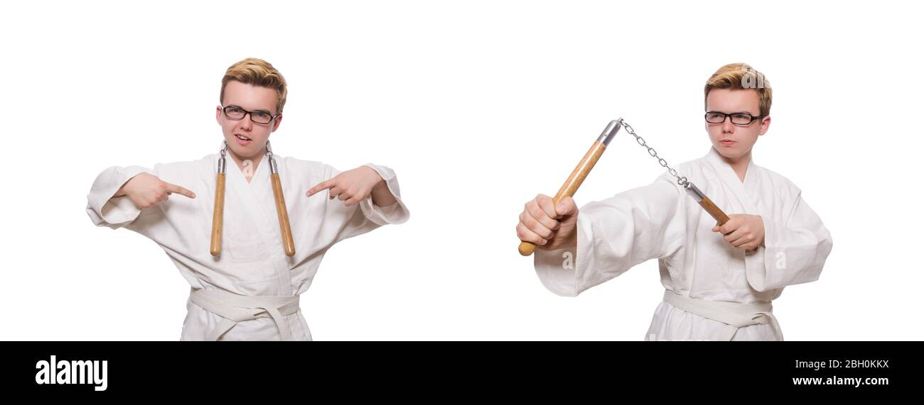Le funny karate fighter avec nunchucks on white Banque D'Images