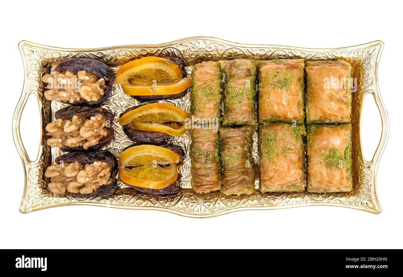 La nourriture arabe ravira baklava, dattes, noix, orange. Hospitalité orientale Banque D'Images