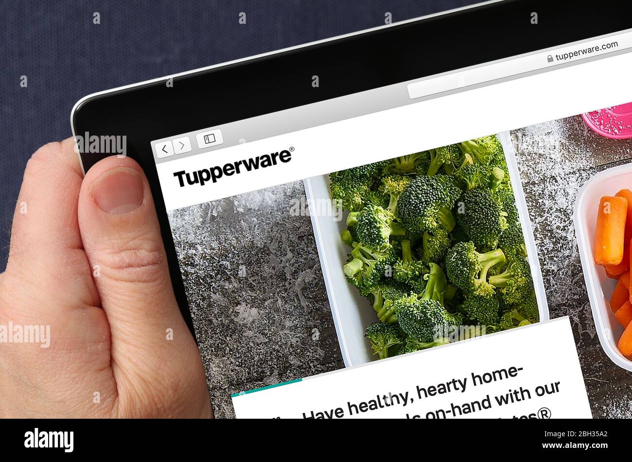 Site Web Tupperware affiché sur un iPad (usage éditorial uniquement) Banque D'Images