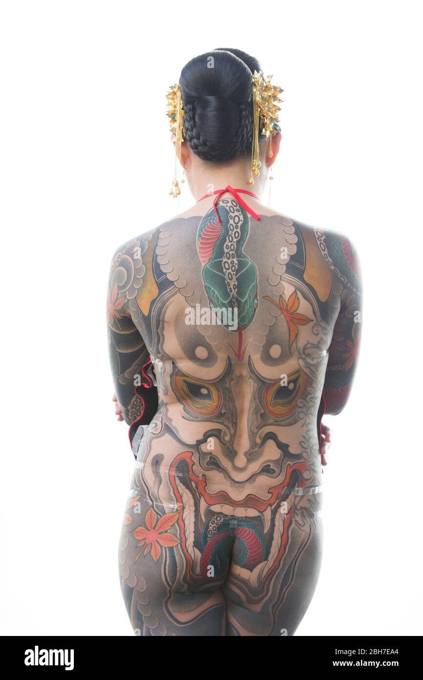 Une femme asiatique avec un tatouage complet du corps, dans un style japonais à la 12ème Convention Tattoo de Londres 2016, Tobacco Dock, 50 Porters Walk, Londres, Royaume-Uni. Banque D'Images