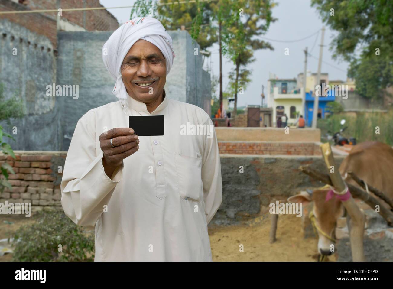 Portrait de la carte de retenue de fermier indien Banque D'Images