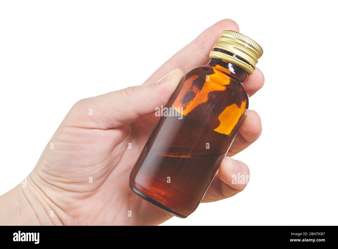 Main avec petite bouteille isolée sur fond blanc. Gros plan Banque D'Images
