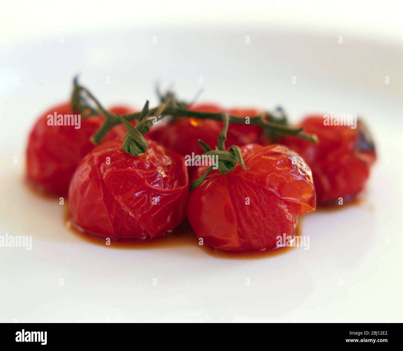 Tomates cerises rôties - Banque D'Images