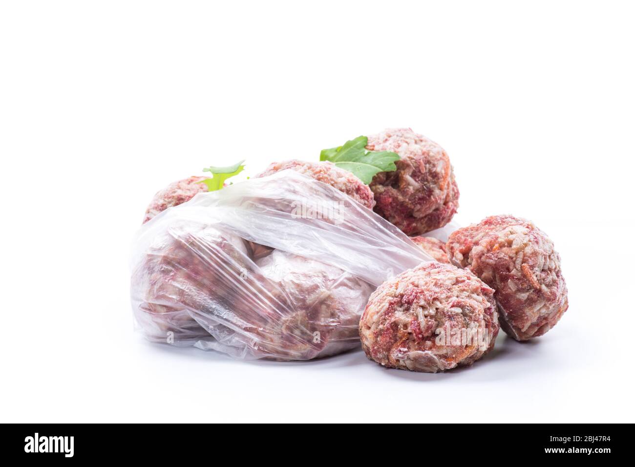 boulettes de viande crues congelées de bœuf et de porc avec carottes et riz Banque D'Images