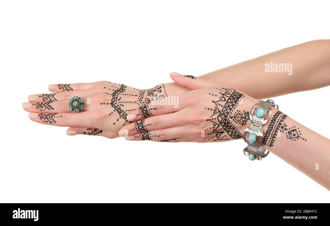 Henné tatouage sur les mains des femmes isolé sur blanc Banque D'Images
