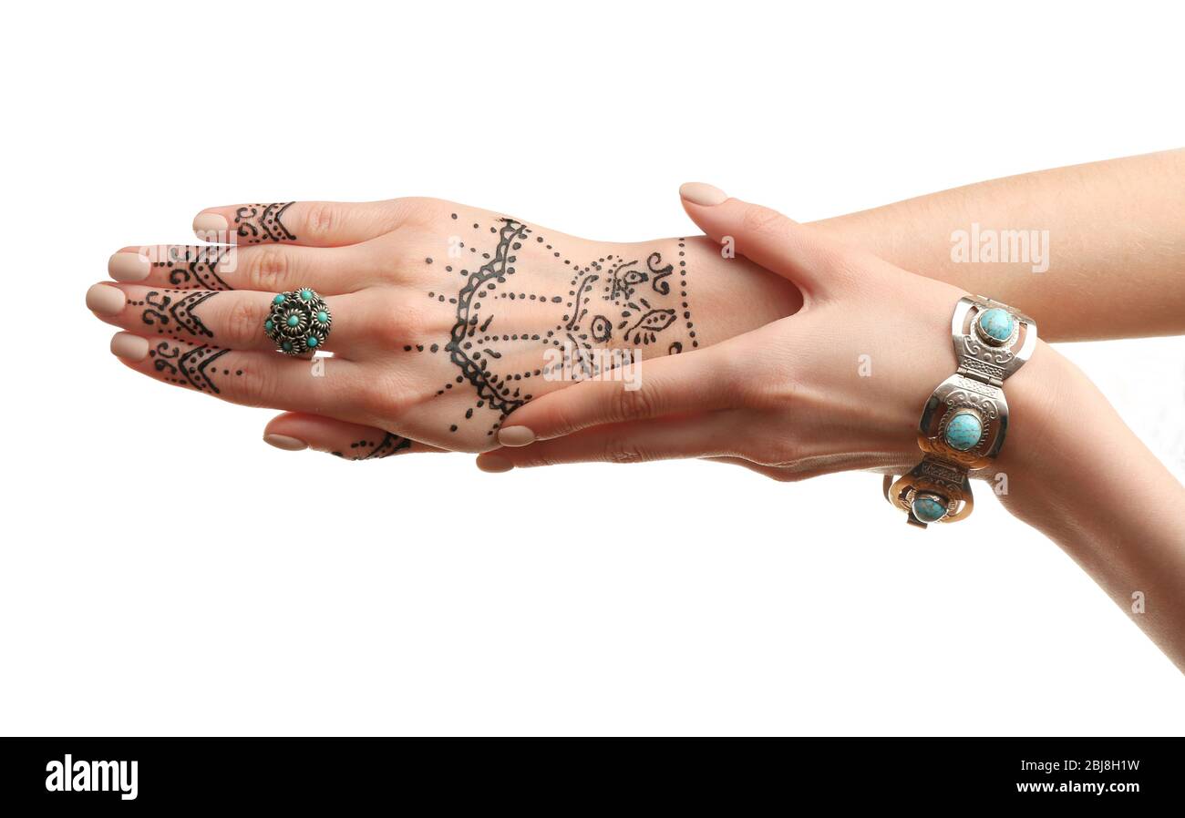 Henné tatouage sur les mains des femmes isolé sur blanc Banque D'Images