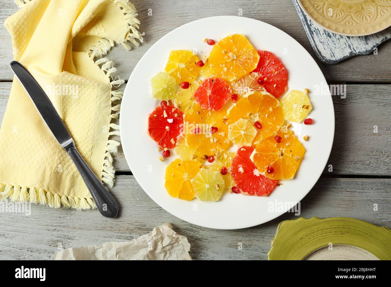 Citruses de coupe sur plaque Banque D'Images
