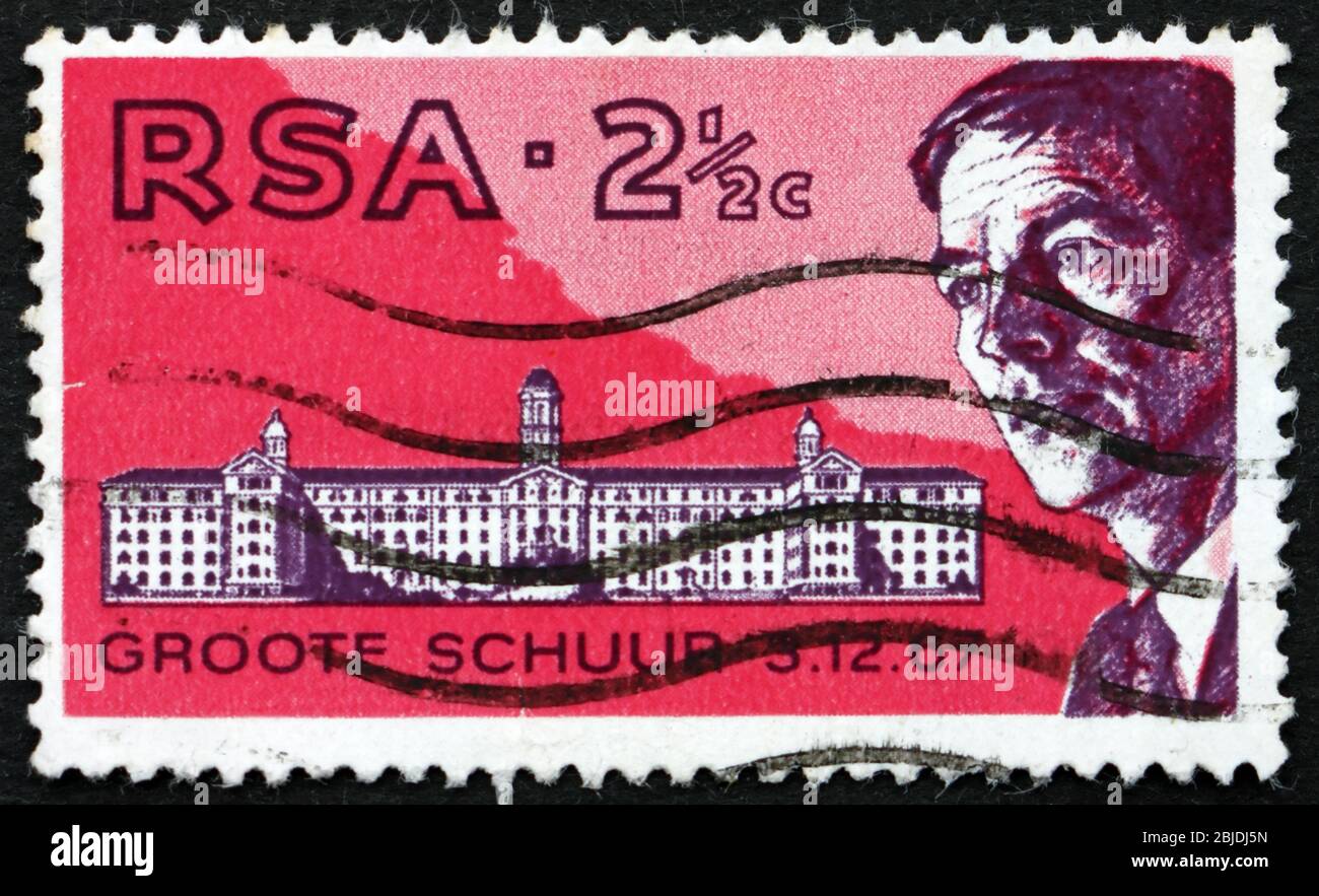 AFRIQUE DU SUD - VERS 1969 : un timbre imprimé en Afrique du Sud montre l'hôpital Groote Schuur et le Dr Christiaan Barnard, 1ère opération de transplantation cardiaque, ci Banque D'Images AFRIQUE DU SUD - VERS 1969 : un timbre imprimé en Afrique du Sud montre l'hôpital Groote Schuur et le Dr Christiaan Barnard, 1ère opération de transplantation cardiaque, ci Banque D'Images