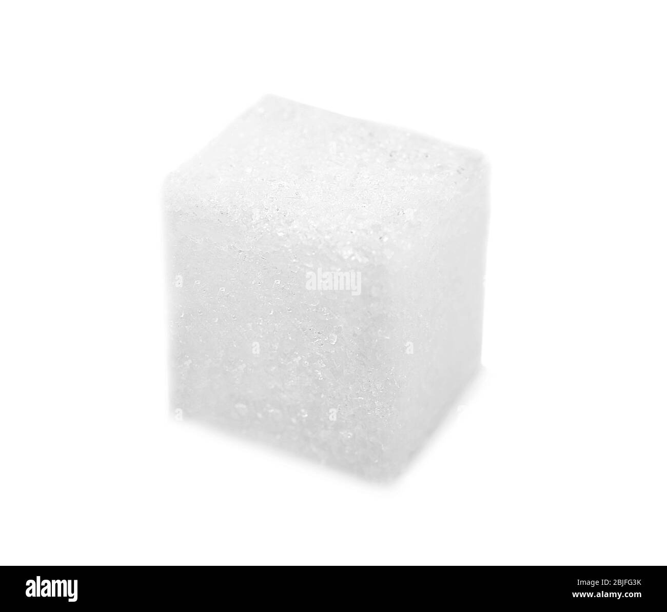 Cube de sucre sur fond blanc Banque D'Images