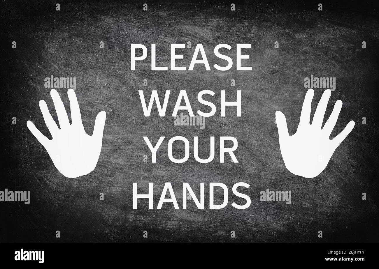 Veuillez laver les mains en vous avertissant au panneau d'entrée sur le tableau noir. Icône mains pour le lavage des mains. Banque D'Images