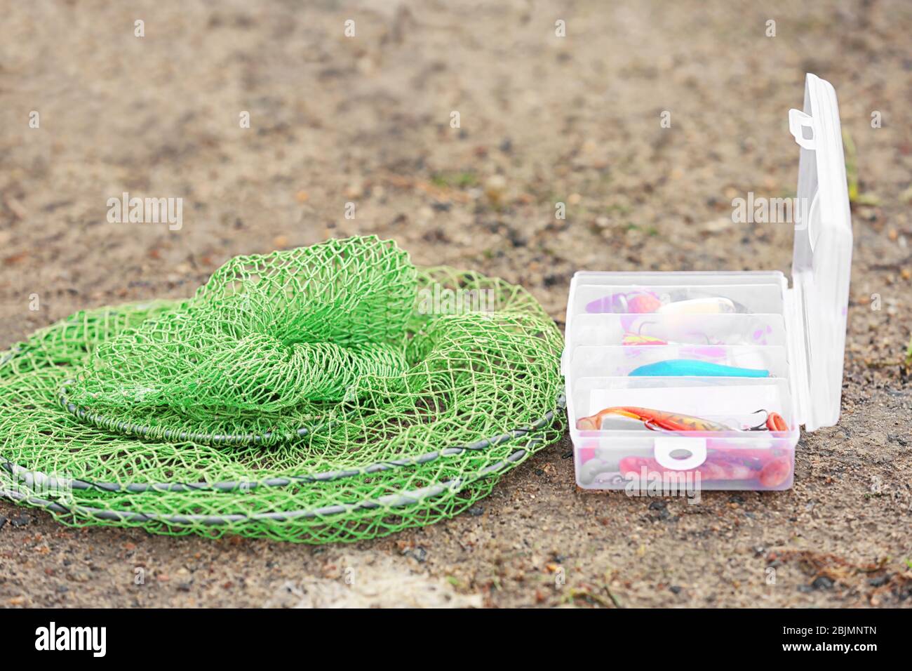 Pêche à la pêche et filet sur la plage Banque D'Images